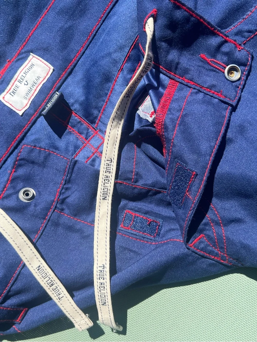 True Religion blue Swim Board Shorts with red Stitching